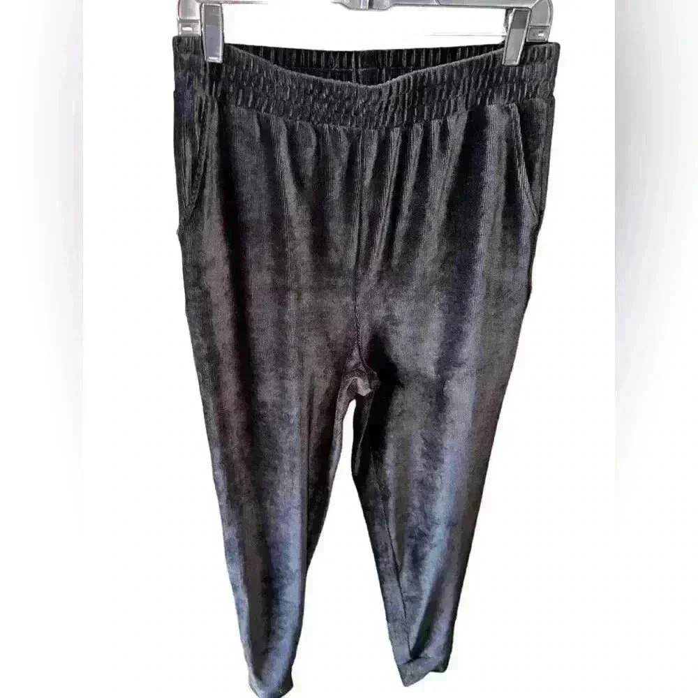 Hyfve large black ribbed velour joggers. Front slit pockets bands‎ at ankles.